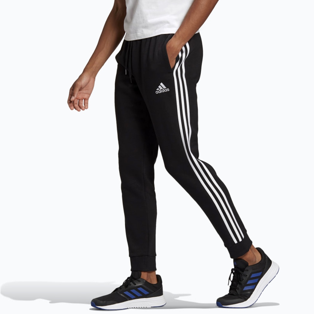 ADIDAS PANTALONI ESSENTIALS FLEECE TAPERED CUFF 3-STRIPES FELPA GARZATA GM1089