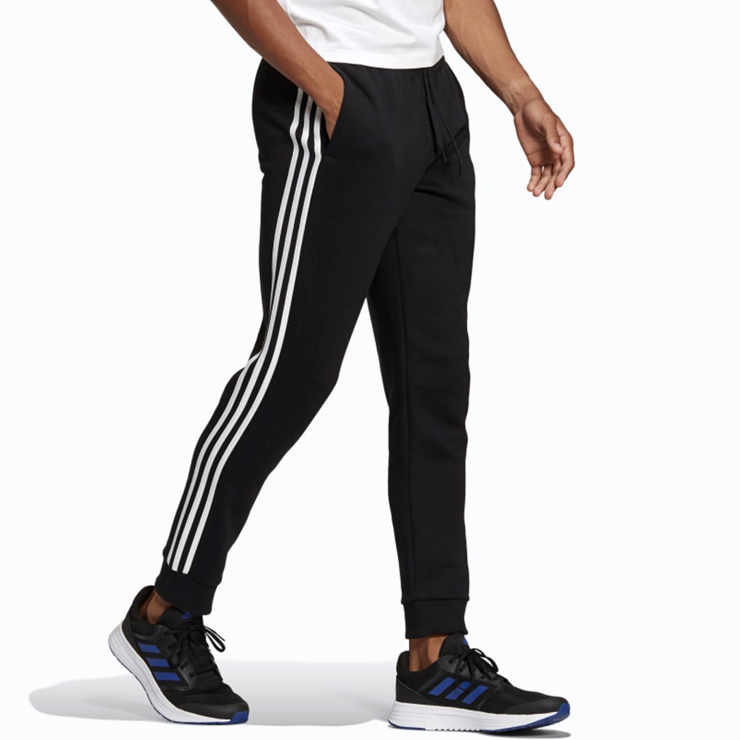 ADIDAS PANTALONI ESSENTIALS FLEECE TAPERED CUFF 3-STRIPES FELPA GARZATA GM1089