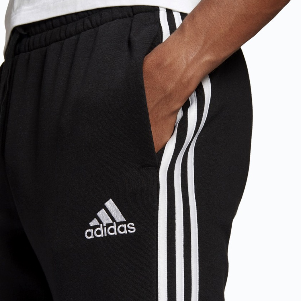 ADIDAS PANTALONI ESSENTIALS FLEECE TAPERED CUFF 3-STRIPES FELPA GARZATA GM1089